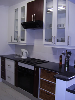 Economy Kitchen in White with Mahogany Melamine